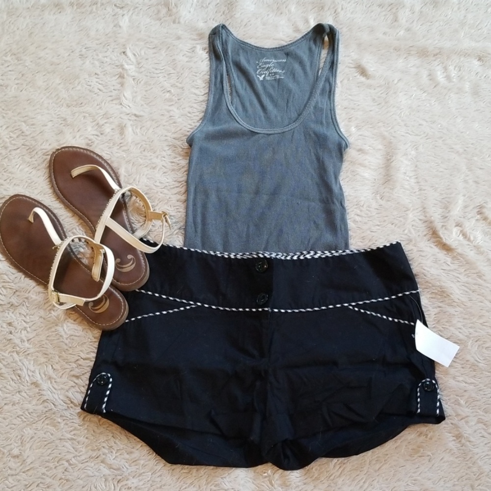 Never been worn black and plaid shorts